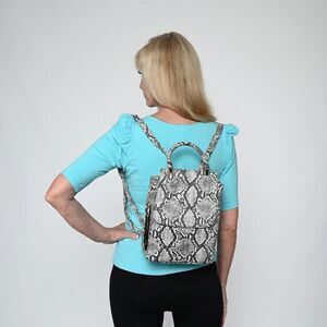 Le Chateau Black & White Snake Print Backpack - like new never used